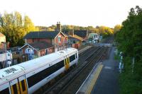 Looking south from the footbridge over the level crossing at <br>
Robertsbridge on 25 October 2010 as a Southeastern Charing Cross - Hastings service calls at the station.<br><br>[John McIntyre 25/10/2010]