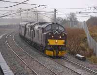 A pair of West Coast Railway class 37s heading west near Forrestfield with a 'Spitfire Railtours' excursion on a grey and wet 6 November 2010.<br><br>[Bill Roberton 06/11/2010]