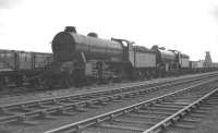 A pair of K2 2-6-0s stored in the sidings at Immingham. The locomotives are thought to be 61773 (nearest) and 61756, both officially withdrawn from Colwick shed, Nottingham, in December 1960 and cut up at Doncaster works later the same month.<br>
<br><br>[K A Gray //1960]