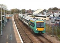 Looking east from the footbridge at Rye station on 26 October 2010 <br>
as 171724 arrives with a service to Hastings and Brighton. Like many of the stations on the line, the platforms are staggered, with the westbound platform (and main station building) located behind the camera. <br>
<br><br>[John McIntyre 26/10/2010]