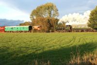 GWR 0-6-0PT no 1638 is seen having just left Rolvenden station on 23 October 2010 with the last train of the day. It will soon tackle the climb up the bank to Tenterden Town, the eastern terminus of the present day Kent & East Sussex Railway.<br>
<br><br>[John McIntyre 23/10/2010]