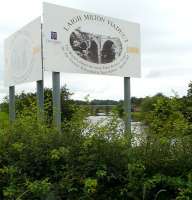 Looking beyond the description board of Laigh Milton Viaduct on 23 July 2010 towards the historic structure spanning the River Irvine in East Ayrshire. The 1812 viaduct, which once carried the Kilmarnock and Troon Railway, was closed in 1846 when the railway was realigned. Restored between 1992 ad 1996, access today is via a path alongside the river.<br><br>[Ken Browne 23/07/2010]