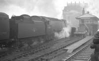Bulleid <I>West Country</I> Pacific no 34102 <I>Lapford</I> seen shortly after arrival at a murky Nottingham Victoria with a football special from Southampton on Saturday 30 March 1963.<br><br>[K A Gray 30/03/1963]