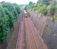 A Dunblane - Edinburgh Waverley 158 runs through the deep cutting at Winchburgh in August 2006.<br><br>[John Furnevel 11/08/2006]