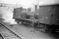 Station pilot J72 0-6-0T no 68680 shunts a fish van at Newcastle Central in June 1958.<br><br>[Robin Barbour Collection (Courtesy Bruce McCartney) 07/06/1958]