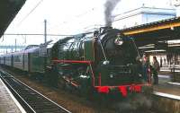 29 013 at Louvain Station on 14 May 1978 waiting to depart for a round trip to Ypres via a few country branch lines. I am told this was the last operational steam locomotive on the Belgian Railways (SNCB), kept in working order for specials.<br>
<br><br>[Peter Todd 14/05/1978]