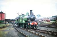 Ex-Great North of Scotland Railway 4-4-0 No 49 <I>Gordon Highlander</I>, in the sidings at the south end of Lockerbie station on 13 June 1959. The locomotive had brought in the SLS <I>Golden Jubilee Special</I> from Glasgow Buchanan Street and was about to run round prior to taking the 5 coaches plus observation car on to Dumfries tender first via the Lochmaben line. The ensemble would later return north from Dumfries via the G&SW route with the tour finishing at St Enoch. <br><br>[A Snapper (Courtesy Bruce McCartney) /06/1959]