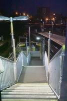 Temporary stairs on platforms 12 and 13 at Clapham Junction in July 2010 [see image 30662 for reason]. These are better built and lit than some permanent stairs I know...<br><br>[Ken Strachan 03/07/2010]