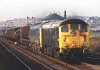 A green/blue class 24 combination powers an up mixed freight southwards along the Midland <I>Old Road</I> at Beighton Junction to the east of Sheffield in the summer of 1971. Leading locomotive is 5001 with 5160 behind.<br><br>[Bill Jamieson 20/09/1971]