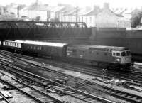 <h4><a href='/locations/N/Newport'>Newport</a></h4><p><small><a href='/companies/S/South_Wales_Railway'>South Wales Railway</a></small></p><p>33.059 hauling VSOE stock (empty, if I recall correctly) east into  Newport in the late eighties. Cardiff was an <I>Orient Express</I> destination in those days. 9/125</p><p>/08/1987<br><small><a href='/contributors/Ken_Strachan'>Ken Strachan</a></small></p>