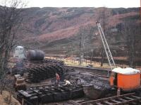 Activity in the yard at Glenoglehead Crossing, between Balquhidder and Killin Junction, employed as a base for Dunblane-Crianlarich track-lifting operations in December 1966.<br>
<br><br>[Frank Spaven Collection (Courtesy David Spaven) /12/1966]