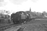 Ivatt 2-6-0 no 43121 stands at Alston station with the BLS/SLS <i>Scottish Rambler no 6</i> on 26 March 1967. 43121 had brought in this leg of the railtour from Upperby and was now preparing to head for Citadel Station on a circuitous route via the Carlisle goods lines, Riddings Junction and Langholm.<br><br>[K A Gray 26/03/1967]