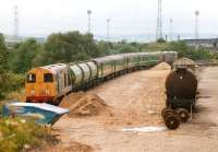 Hunslet Barclay 20902 <I>Lorna</I> and 20905 <I>Iona</I> top and tail a weedkilling train stabled in Horbury Bridge goods yard on 24 June 1990.<br><br>[David Pesterfield 24/06/1990]