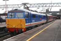 Virgin West Coast no 87012 <I>The Olympian</I> calls at Stafford on 5 March 2005 with a Manchester - Euston service.<br><br>[Ian Dinmore 05/03/2005]