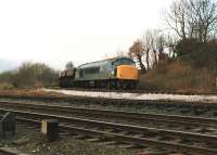 Peak 45012 leaves the Copy Pit line east of Todmorden Station with coal empties on 21 January 1988.<br><br>[David Pesterfield 21/01/1988]