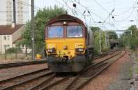 DBS 66016 about to back onto a charter train having crossed the River Ayr viaduct to enter Ayr station from the north on 3 July 2010. The train is the return Compass Tours <I>Ayrshire Coast Explorer</I> to Broad Green.<br><br>[John McIntyre 03/07/2010]