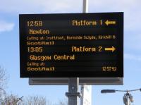 New Customer Information Screen at Langside seen on 27 November. <br>
Unlike previous installations of CIS at island stations the latest wave has a single screen for both platforms. Arrows are programmed in to make it clearer which platform is being referred to even if it gives the impression the numbers might swap over at any time! Note 'Burnside Sclyde': this is the name according to the National Ticketing System even though there is only one Burnside so spelled and Strathclyde was abolished 15 years ago. The NTS name of Newton is Newton (Lanark); this should really be 'Lanarks' but anyway the suffix is not displayed, presumably as it could suggest that the train was actually going to Lanark.<br><br>[David Panton 27/11/2010]