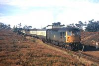 Scene on the Far North line in the summer of 1971, as 5332 takes a train away from the platform at Altnabreac on its journey to Wick. <br><br>[David Spaven //1971]