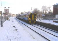 The euphonious, alliterative and plurally plosive Possilpark & <br>
Parkhouse on the Maryhill line.  A snow-capped 158 872 calls on its way to Anniesland on 27 November.<br>
<br><br>[David Panton 27/11/2010]