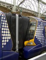 Units 380109 and 380106 at platform 14 of Glasgow Central waiting to depart on a driver training run on 17th November showing the gangway connection in place.<br><br>[Graham Morgan 17/11/2010]