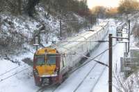 334035 passing through Elderslie on 2nd December slowing as it approaches Johnstone station<br><br>[Graham Morgan 02/12/2010]