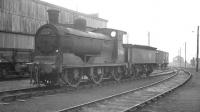 Doomed McIntosh 3F no 57550 stands alongside Bathgate shed in November 1963, minus some key components. The locomotive was disposed of via Messrs Arnott Young, Carmyle, some 6 months later.<br><br>[K A Gray 18/11/1963]