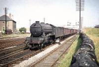 With just 2 months to go before withdrawal by BR, Gresley K3 2-6-0 no 61876 heads west at Saughton Junction with a freight on 31 July 1959. The train is about to turn north and take the Forth Bridge line.   <br><br>[A Snapper (Courtesy Bruce McCartney) 31/07/1959]