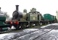 LSBCR class E1 0-6-0T awaiting an expensive boiler repair at Cranmore in December 2010.<br>
<br><br>[Peter Todd 04/12/2010]