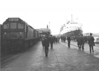 </i>Grand Scottish Tour no 2</i> stands at Stranraer Harbour on 27 May 1967. The train had arrived from Ayr behind Type 2s D7612+D7614 which will now run round in preparation for the return journey. The <I>Caledonian Princess</I> is berthed alongside.<br><br>[Jim Peebles 27/05/1967]