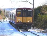 314 204 approaches Langside with a Cathcart Outer Circle service on 27 November 2010.  Mary Queen of Scots' forces were defeated at Langside in 1568 in a family quarrel over her infant son.  Not a lot went right for that woman<br><br>[David Panton 27/11/2010]