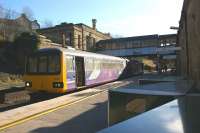 Having arrived from Leeds via Skipton and Carnforth, 144006 waits at plaftorm 5 of Lancaster station befor reversing and heading for Heysham Port on 11 February 2010. There will be one more reversal for the DMU before the end of its journey - at Morecambe.<br>
<br><br>[John McIntyre 11/02/2010]