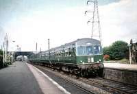 An Edinburgh - North Berwick DMU calls at Joppa on 8 August 1959. The rear end of a diesel shunter operating in Portobello yard can be seen in the background.<br><br>[A Snapper (Courtesy Bruce McCartney) 08/08/1959]