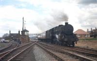 With a Black 5 in charge, a lightly-loaded Edinburgh Princes Street - Carstairs train speeds west through Kingsknowe in the early summer of 1966.<br><br>[Frank Spaven Collection (Courtesy David Spaven) //1966]