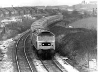 47480 <I>Robin Hood</I> approaches Lostock Hall Junction with a diverted Up passenger service that has run via the S&C, Hellifield and Blackburn. The cleared area by the catch points is where the former line to Todd Lane Junction and Preston E.L. diverged until 1972. Brush Type 4 47480, which emerged from Crewe in 1964 as D1616, subsequently became 47971 but was withdrawn in 1998 and cut up at EMR Kingsbury in 2001. <br><br>[Mark Bartlett 12/01/1981]