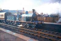 Ex-CR 4-2-2 no 123 stands at Lanark station on 26 April 1958 with the <I>'Caledonian 123 Excursion'</I>. The special ran to Muirkirk and back and a second class return ticket cost 2/6d (12.5p).<br><br>[A Snapper (Courtesy Bruce McCartney) 26/04/1958]