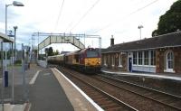 DBS 67020 with the ecs of the <I>Northern Belle</I> as it heads east through Cardross on its way to Edinburgh for stabling. The train had earlier travelled from London to Helensburgh Upper on 25 July 2009. The section of the platform next to the locomotive has now been raised to the usual height during work in November 2010.<br>
<br><br>[John McIntyre 25/07/2009]