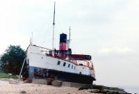 PS <I>Lincoln Castle</I> on the north bank of the Humber near Hessle in July 1986. The vessel was built by A & J Inglis Ltd at Pointhouse, Glasgow in 1940 for the London & North Eastern Railway. In spite of efforts to preserve her (her fleetmates Wingfield Castle and Tattershall Castle survive) she was broken up at Grimsby in October 2010. [See image 31941]<br><br>[Colin Miller /07/1986]
