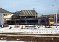 170 428 forms the 13.14 service from a wintry Perth to Glasgow Queen Street on 13 December.<br><br>[Andrew Wilson 13/12/2010]