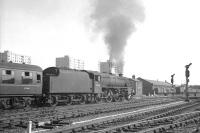 Black 5 no 45444 takes the 2.35pm Scarborough - Nottingham Midland service away from Doncaster on 20 July 1963.<br><br>[K A Gray 20/07/1963]