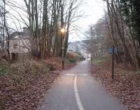 A short single track line from Lancaster Castle dropped down to Lancaster Green Ayre, alongside the River Lune. Originally electrified it closed to passengers in 1966 but remained open to serve Lancaster Power Station until around 1980. The entire length has since been incorporated into Lancaster's network of cycle paths. Early morning view down the hill to Green Ayre from the mid point of the line. <br><br>[Mark Bartlett 13/12/2010]