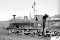 Holmes ex-NB J36 veteran no 65288 of 1897, thought to have been photographed on Dunfermline shed in 1966. This was the locomotive which was latterly 'adopted' by members of Dunfermline High School Railway Society [see image 28648]. Along with classmate no 65345 of Thornton Junction shed this was one of the last two steam locomotives in Scotland to be 'officially' withdrawn in June 1967.<br><br>[Robin Barbour Collection (Courtesy Bruce McCartney) //1966]