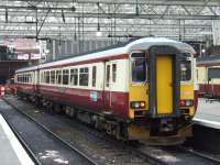 Unit 156433 <I>The Kilmarnock Edition</I> stands at Glasgow Central on 2 June 2007. The unit received a new Saltire livery during 2009, at which time the nameplates were removed. [Railscot note: <I>The Kilmarnock Edition</I> nameplate (together with a copy of this photograph) is now in the possession of the Robert Burns Birthplace Museum, Alloway]. <br><br>[Graham Morgan 02/06/2007]