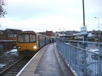 143623 waits to leave Merthyr Tydfil on the 08.38 twin unit service to Bridgend via Barry on 10 December 2010. Standing room only by Llandaff.<br><br>[David Pesterfield 10/12/2010]