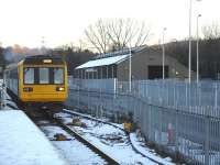 142076 runs into Abercynon on the 15.29 Barry Island service, ex-Merthyr Tydfil. In the right background stands the reclad former 88E Abercynon steam shed, currently occupied by a fireplace company. [It was 1 October 1966 when I was last here. On that day five Class 37s, two class 08s, and a class 14 were on shed.]<br><br>[David Pesterfield 09/12/2010]