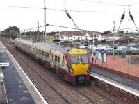 334005 stops at Barassie with the 13.12 to Ayr on 17 December 2010.<br><br>[Ken Browne 17/12/2010]