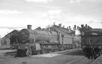 6825 <I>Llanvair Grange</I> looking ready for the road. Photograph taken in the yard at Reading (ex-GWR) shed on 25 September 1963.<br><br>[K A Gray 25/09/1963]