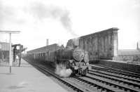 Black 5 no 45437 looks to be marshalling parcels vans in the sidings on the west side of Carlisle station in 1967.<br><br>[Robin Barbour Collection (Courtesy Bruce McCartney) //1967]