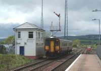 Platform view north at New Cumnock on 27 May 2010 as 156504 pulls away past the signal box on a Carlisle - Glasgow Central service.<br><br>[John McIntyre 27/05/2010]