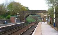 The view north from the Buxton platform at Dove Holes station on 9 <br>
May 2010. Looking under the three overbridges doesn't really give the impression of just how steep the descent is towards Chapel-en-le-Frith.<br>
<br><br>[John McIntyre 09/05/2010]