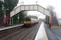 A Gourock bound 314213 calls at Langbank on a stopping train from Glasgow Central. This station overlooks the Clyde Estuary, more or less opposite Dumbarton on the north side.<br><br>[Mark Bartlett 29/12/2010]